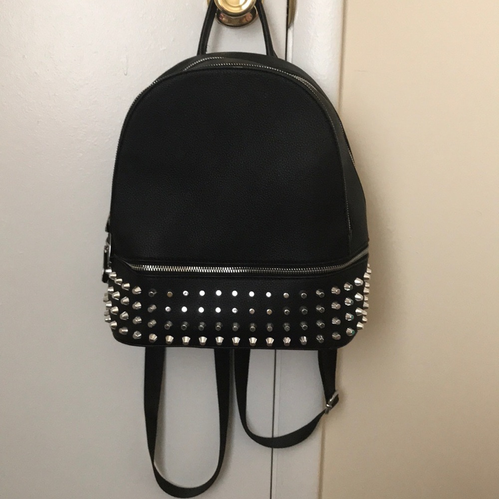 Black and silver book bag with silver studs